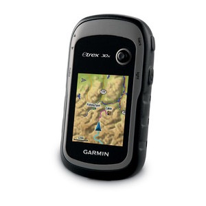 A Garmin eTrex X 30 displays a mountainous region on a map. 